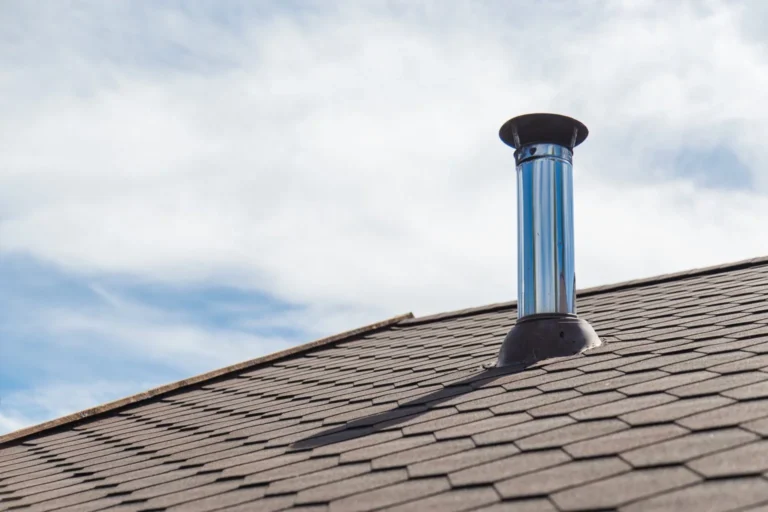 new roof shingles with ventilation pipe