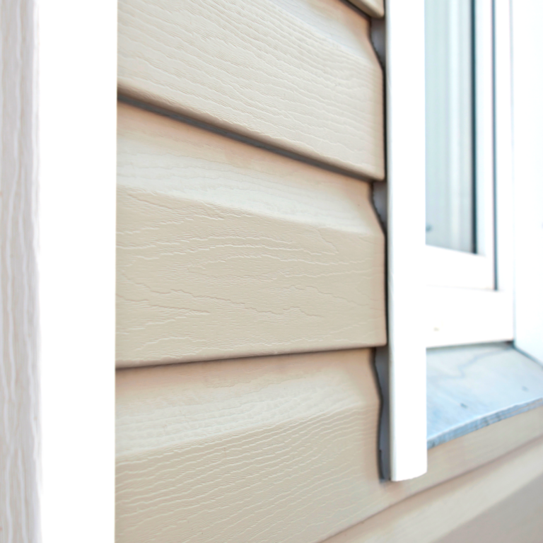 Tan vinyl siding after siding installation on Ossining, NY home