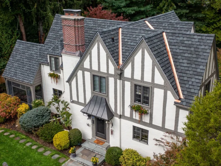 close up view of new gaf roof with copper flashing on bronxville home