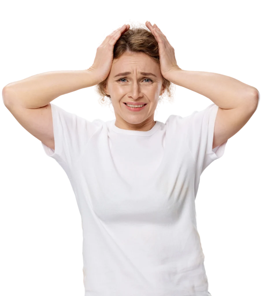 frustrated woman with hands on her head