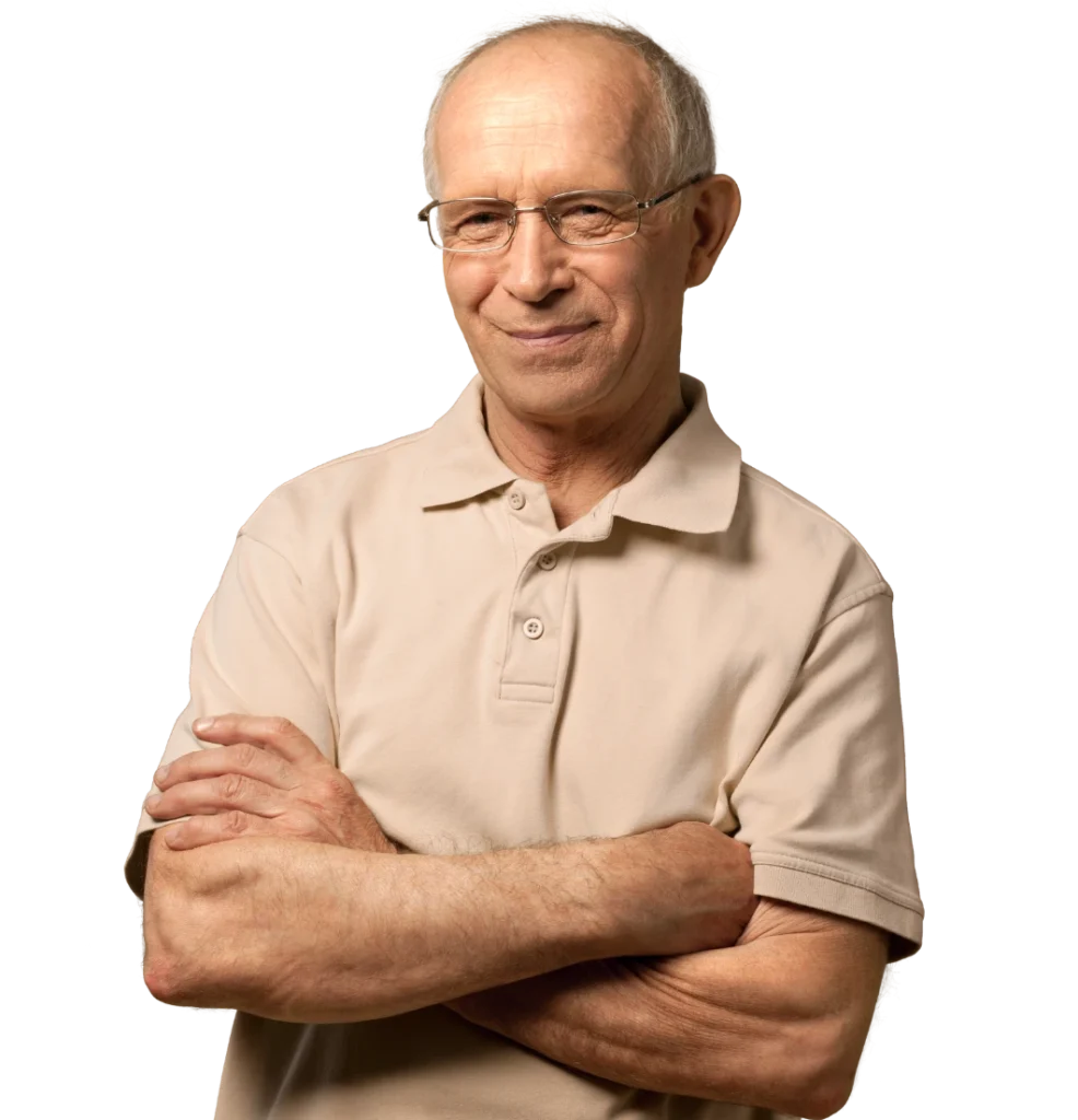 older man in beige polo and glasses
