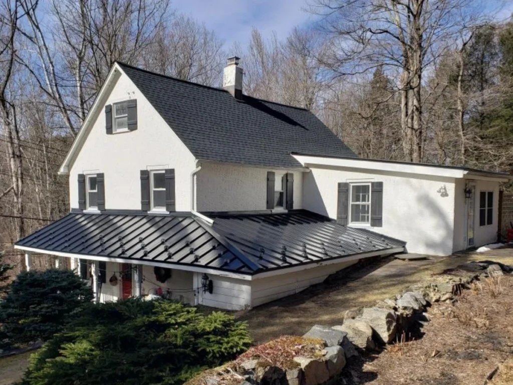 shingle roof replacement with featured metal awnings