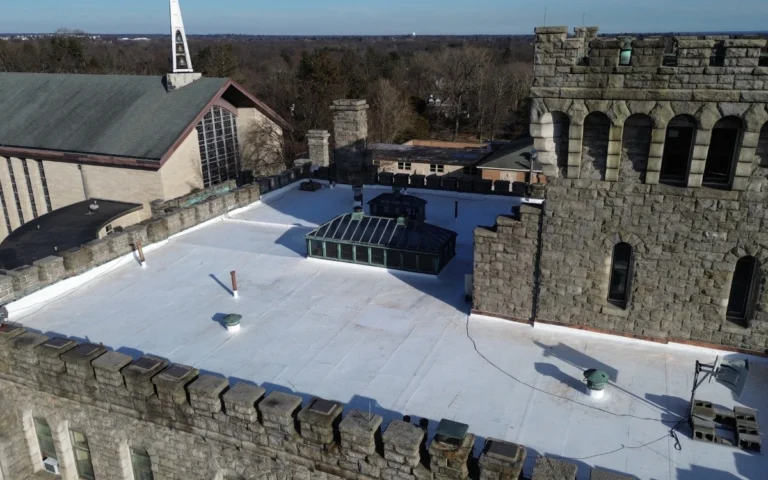 flat commercial roof replacement on Manhattanville Castle