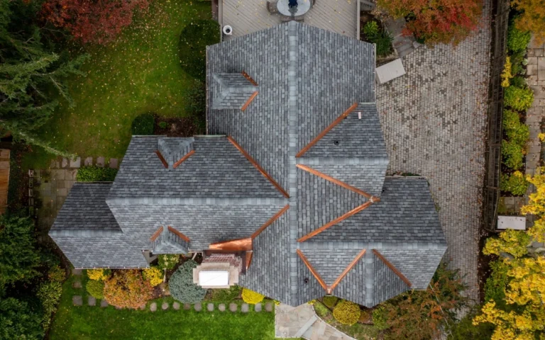 aerial drone view of architectural designer shingle roof after annual maintenance