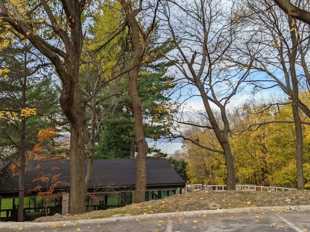 low slope black asphalt roof overlooking hudson river in tarrytown, ny