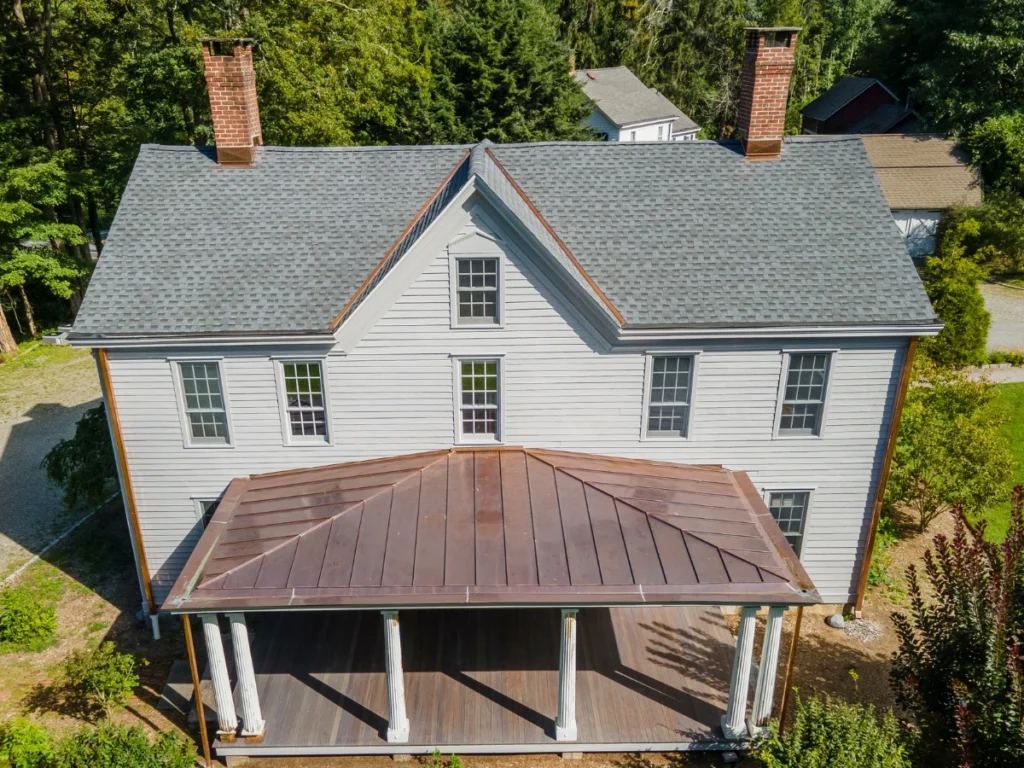 grey GAF roof shingles with copper flashing