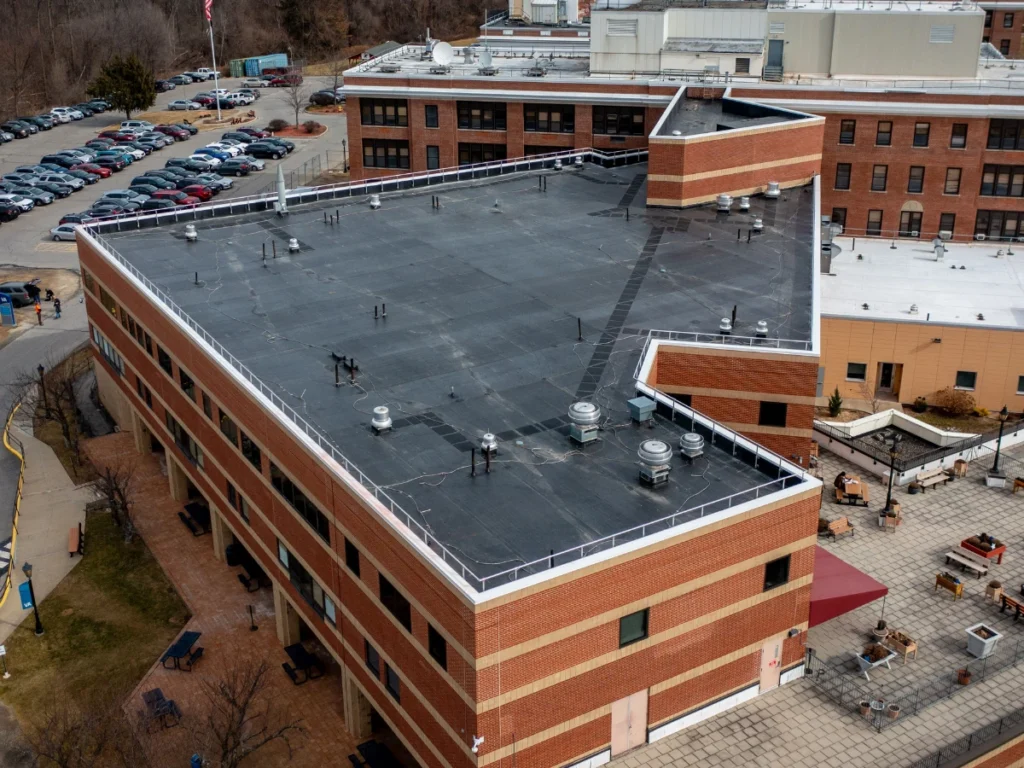 flat commercial roof near bedford ny on large building