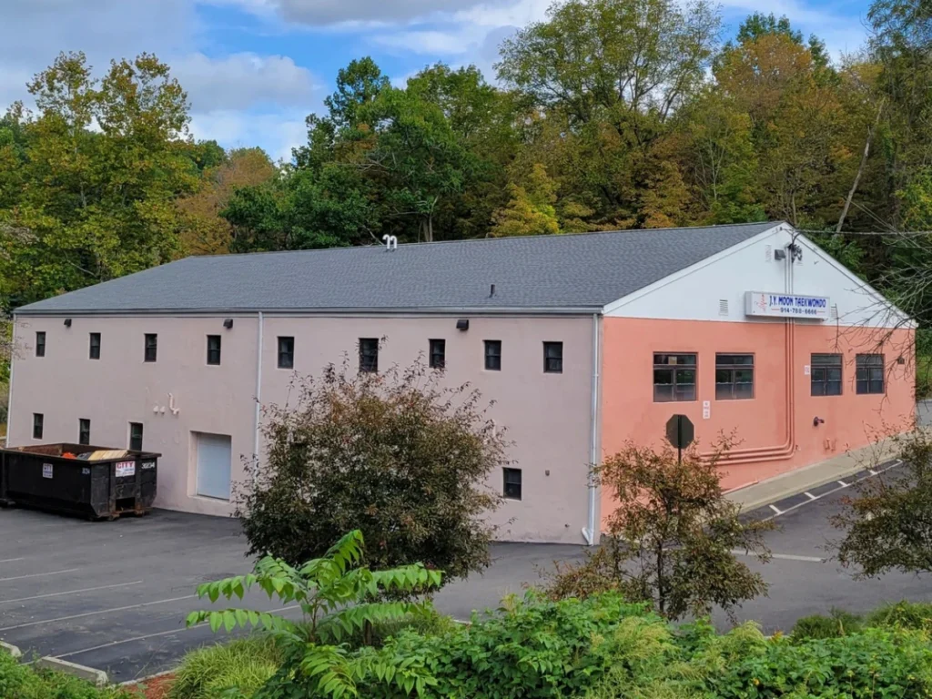 light grey shingle roof on commercial building on albany post rd