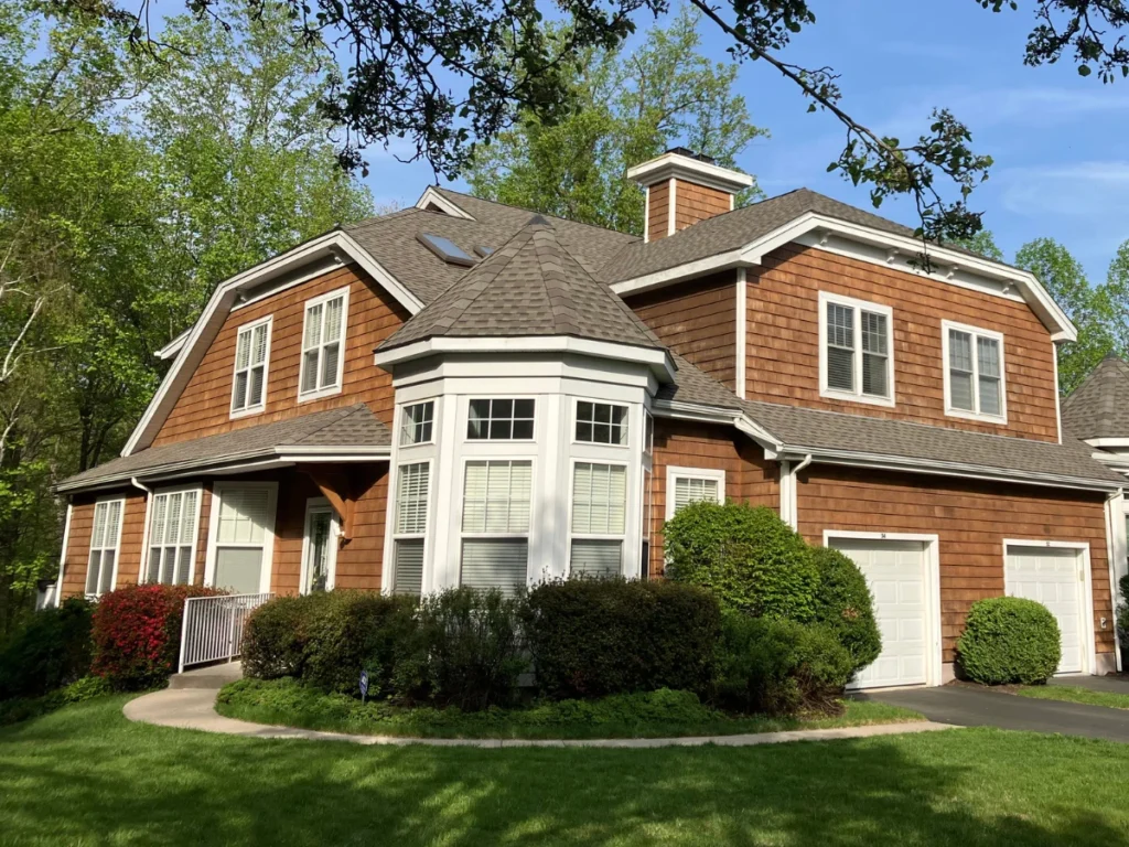 condo with wood shake siding and new shingle roof in tarrytown, ny